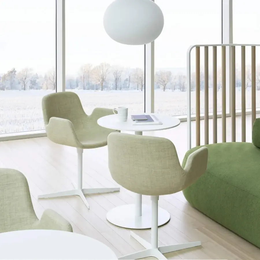 Sophisticated Lapalma Pass armchair with light green textured textile upholstery and smooth white metal swiveling base
