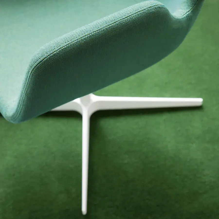 Superior Lapalma Pass armchair with textured teal fabric upholstery, orange threading and smooth white synthetic base
