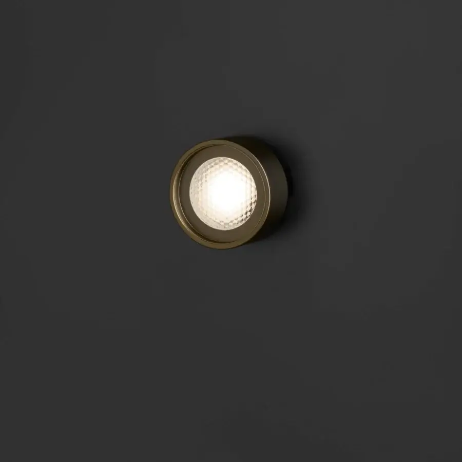 Elegant Oluce Berlin-Out lamp crafted in metal with a textured satin golden-bronze finish and diffusing white glass