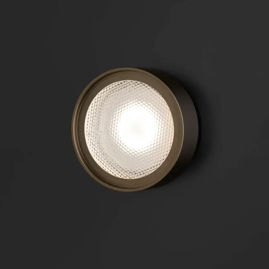 Refined Oluce Berlin-Out lamp crafted in bronze metal with a matte finish and subtly textured glass diffuser