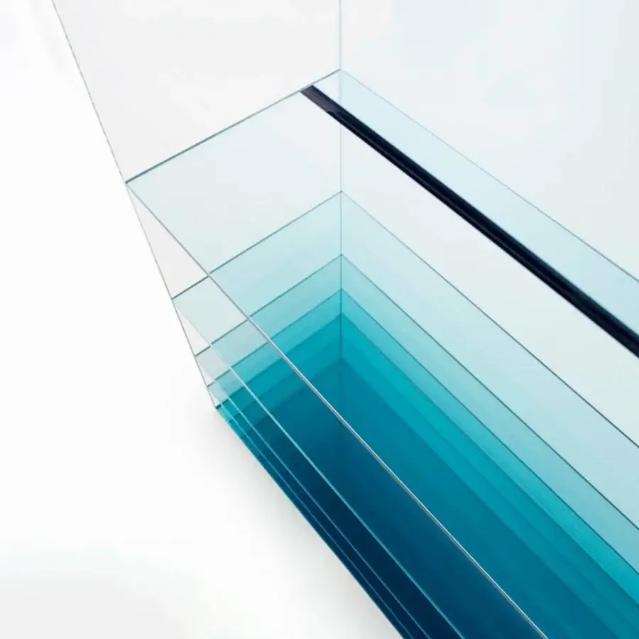 Captivating Glas Italia Deep Sea bookcase in laminated transparent extralight glass with a gradient transitioning to deep teal hues