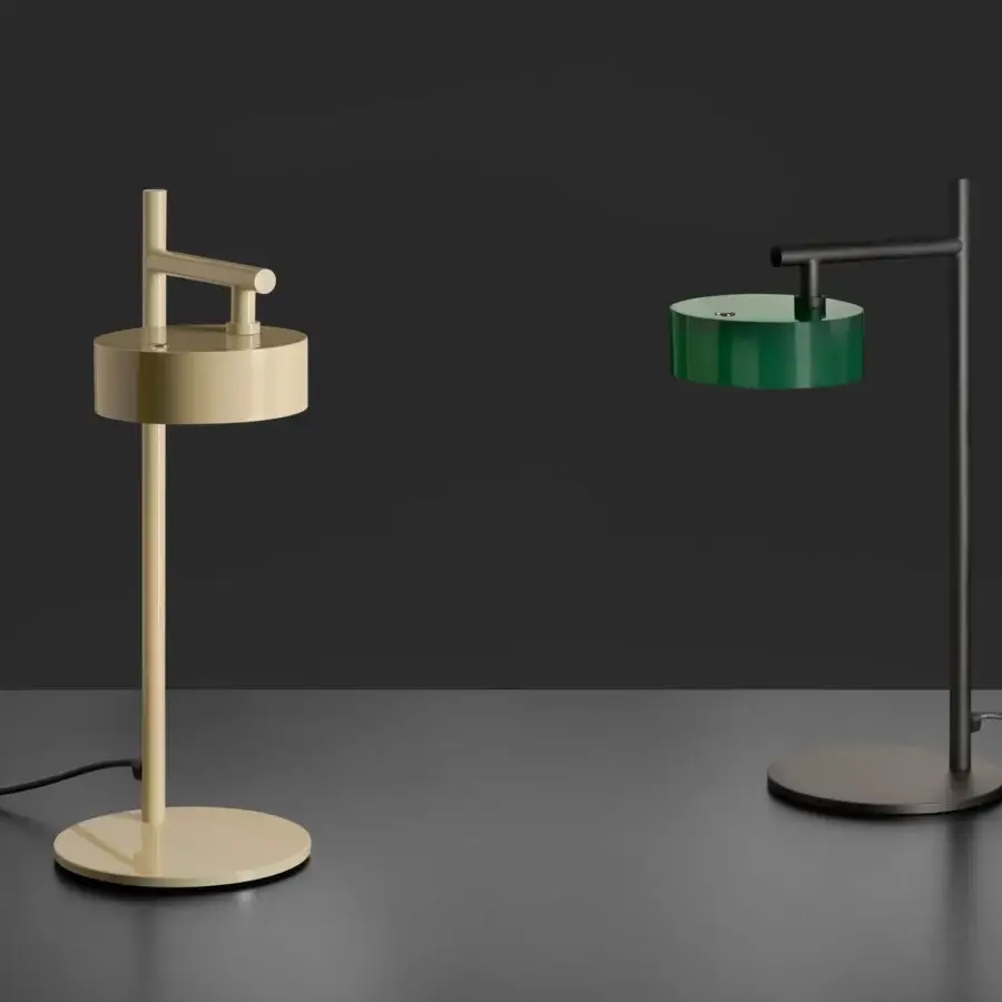 Distinguished Oluce Berlin-Out lamp crafted in pale yellow metal with a smooth satin finish and adjustable arm