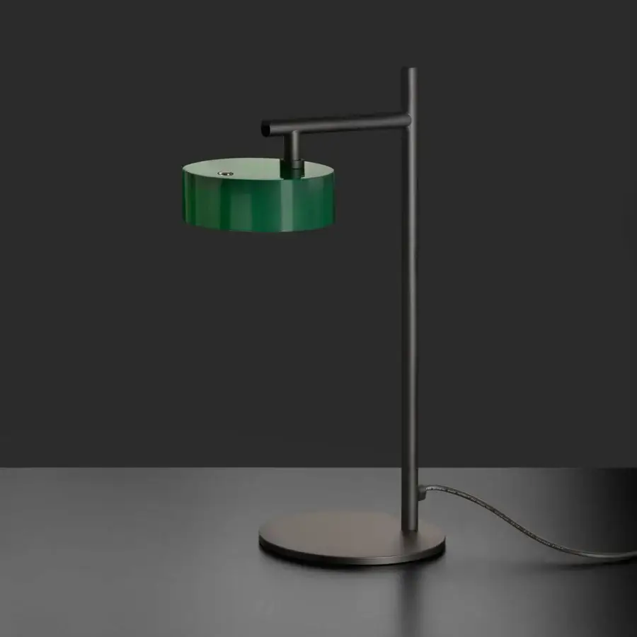 Exceptional Oluce Berlin-Out lamp crafted in metal with a matte finish, presenting a deep green lampshade and charcoal-grey articulating arm