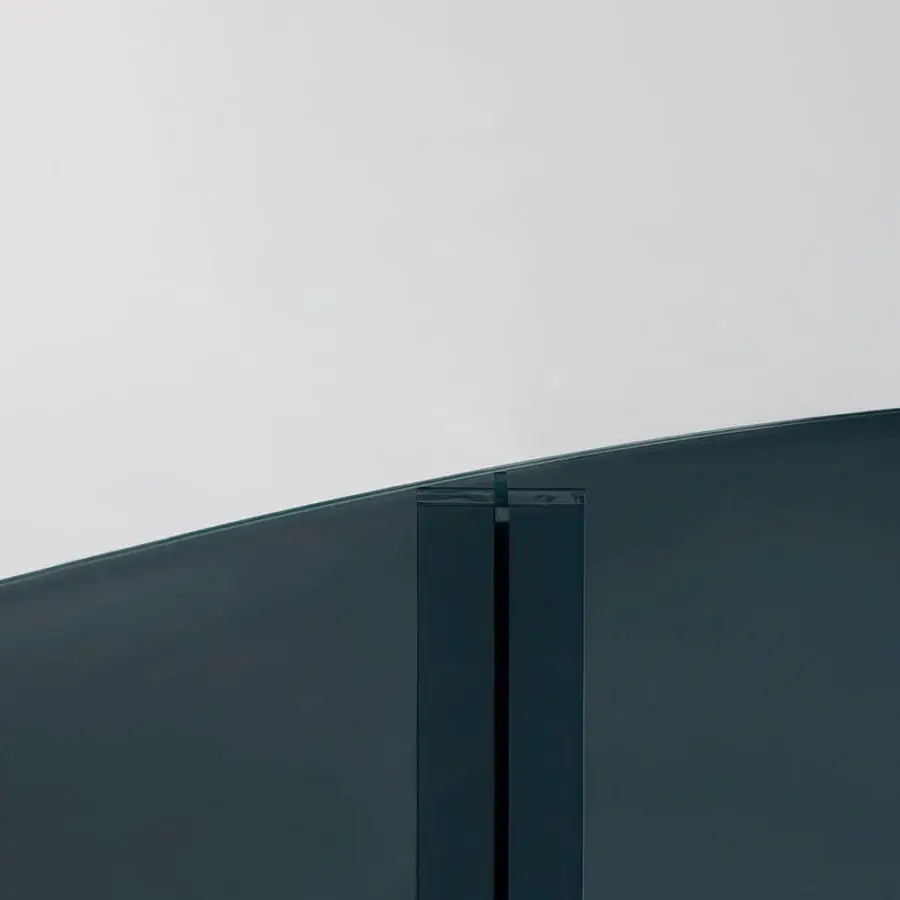 Superior Glas Italia X-T Oval table crafted in blue paste glass with mirror-polished stainless steel legs and UV bonding