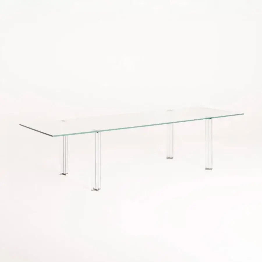 Distinguished Glas Italia X-T rectangular table crafted with transparent glass and mirror-polished stainless steel details in a clear finish
