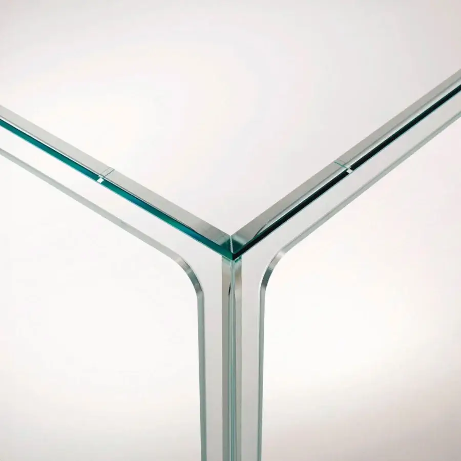 Distinguished Glas Italia Oscar table crafted in transparent extralight glass with a polished metal framework