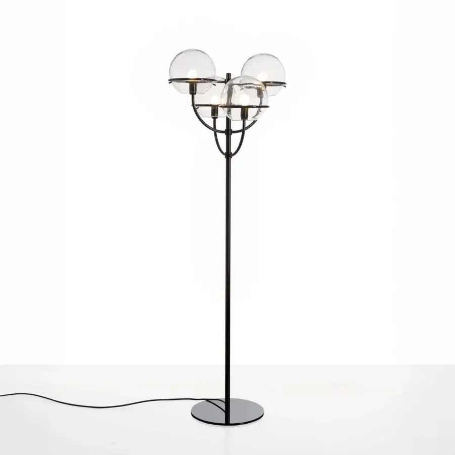 Superior Oluce Lyndon floor lamp crafted in matte black metal with translucent polycarbonate spheres for warm light