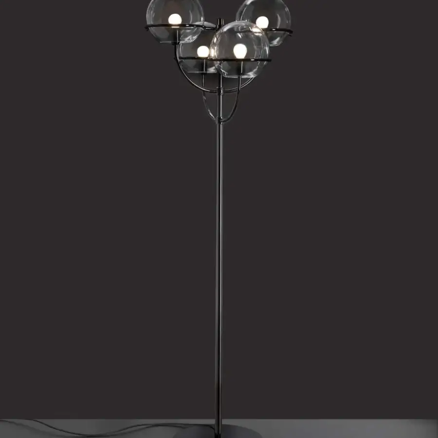 Distinguished Oluce Lyndon floor lamp crafted in Italy with a sleek metal stem and transparent polycarbonate spheres in a dark satin finish
