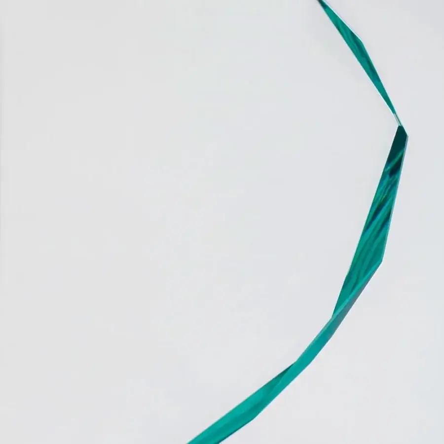 Distinguished Glas Italia Hub table crafted from 15mm extralight tempered glass with a teal gradient and borosilicate base in stainless steel