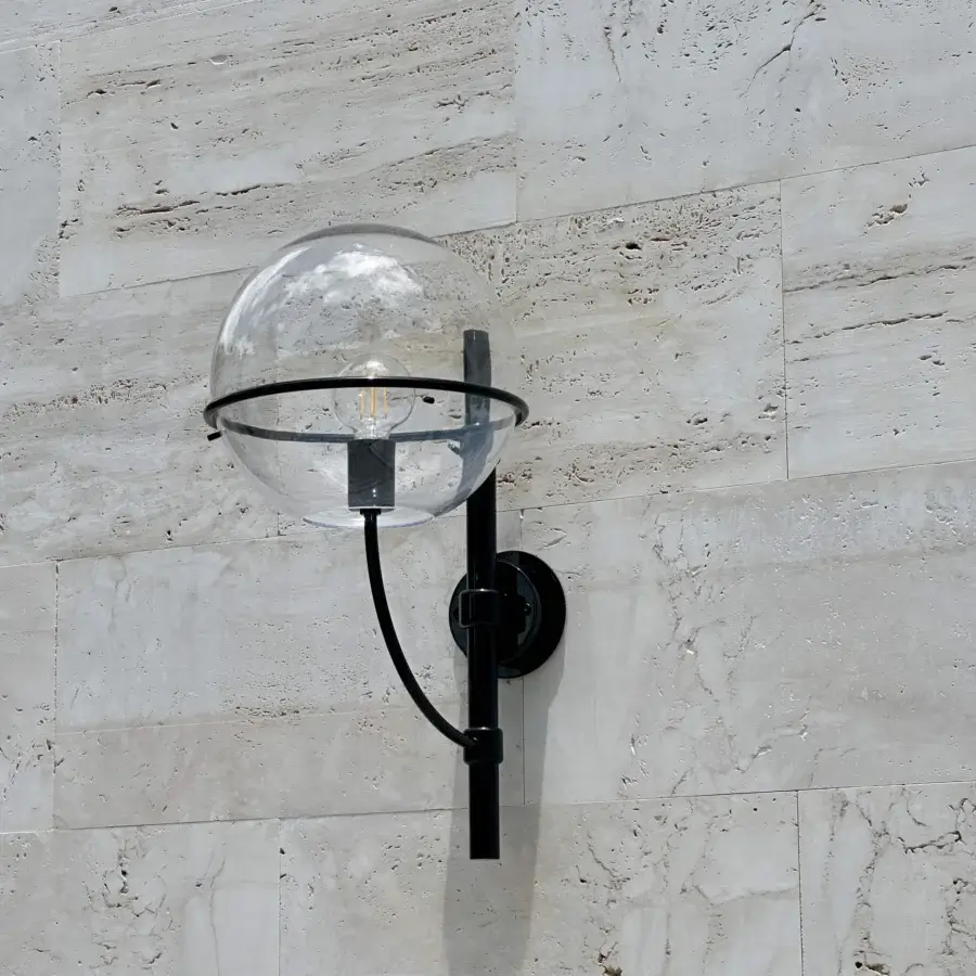 Superior Oluce Lyndon wall lamp with a sleek matte black metal frame and clear polycarbonate spheres crafted in Italy