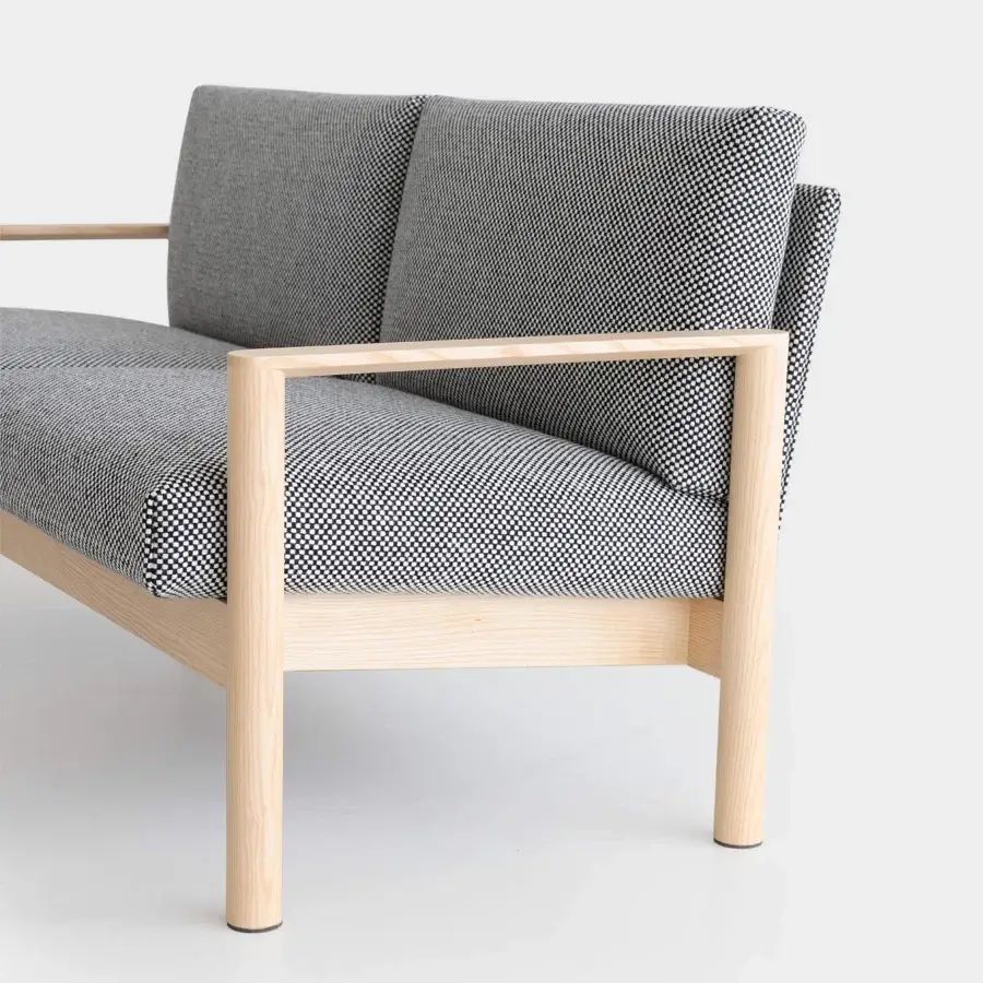 Distinguished Lapalma 10:30 sofa with dark gray patterned weave upholstery and solid ash base construction