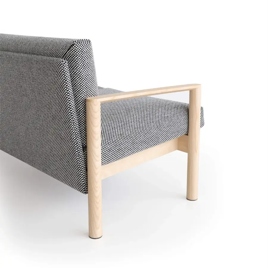 Architectural Lapalma 10:30 sofa with dark gray woven textile upholstery and solid ash base construction
