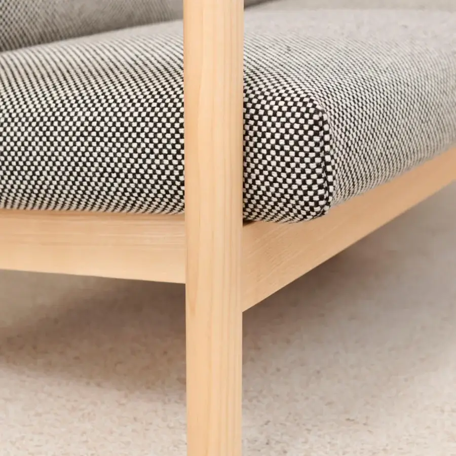 Elegant Lapalma 10:30 sofa with grayscale checkered textile upholstery and solid ash base construction