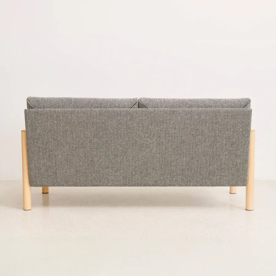 Distinguished Lapalma 10:30 sofa with muted gray textured textile upholstery and light-colored solid ash base