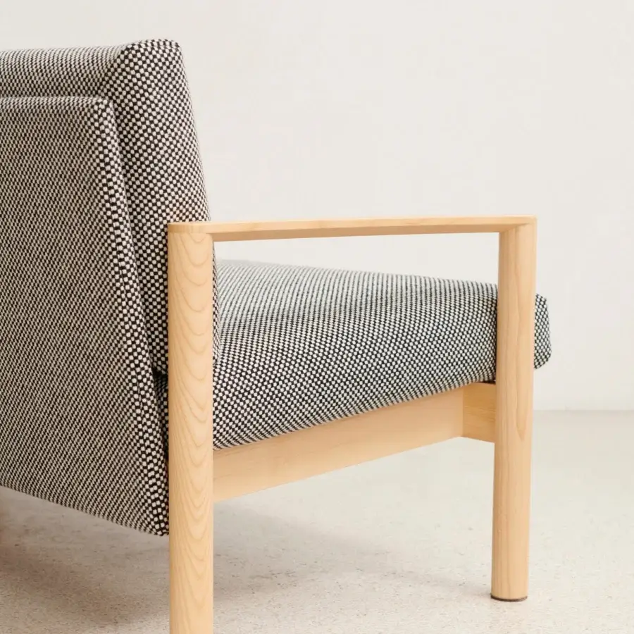 Elegant Lapalma 10:30 sofa built with a solid ash base and upholstered in dark gray and white geometric textile