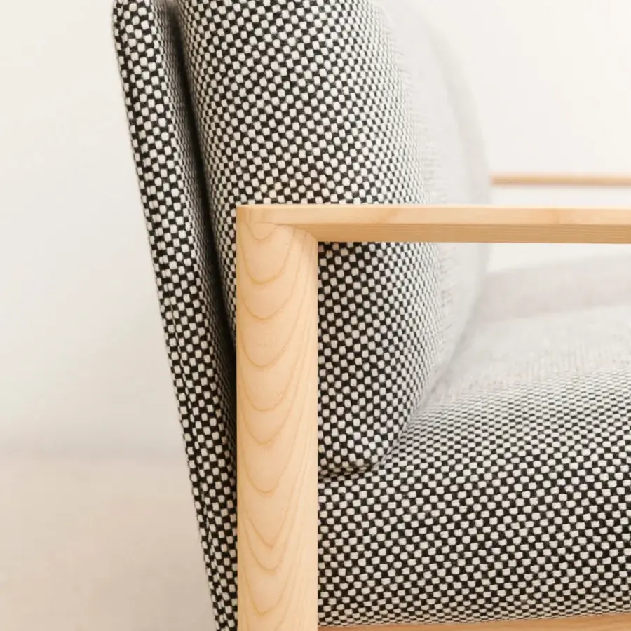 Superior Lapalma 10:30 sofa crafted with a solid ash base and upholstered in black and off-white geometric textile