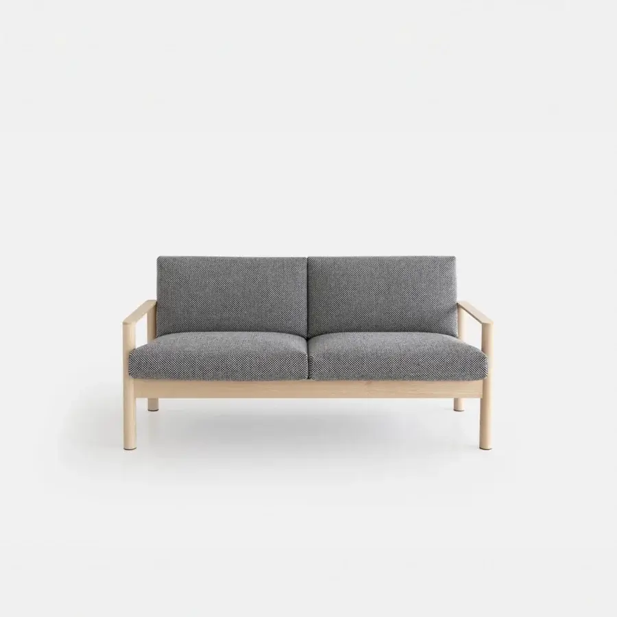 Distinguished Lapalma 10:30 sofa with a solid ash base and dark gray textured upholstery exhibiting architectural form