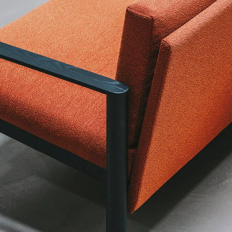 Elegant Lapalma 10:30 sofa upholstered in vibrant orange textile with a sleek metal frame and solid ash base