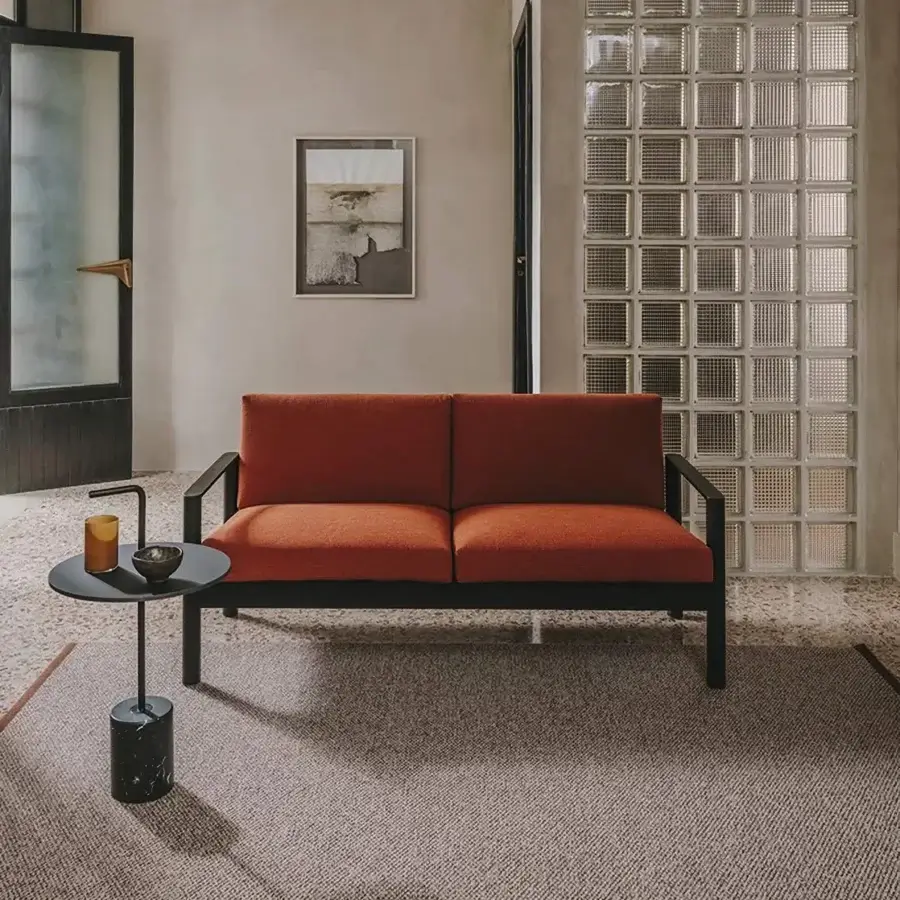 Distinguished Lapalma 10:30 sofa crafted with a solid ash base and reddish-orange textile upholstery with a matte black metal frame