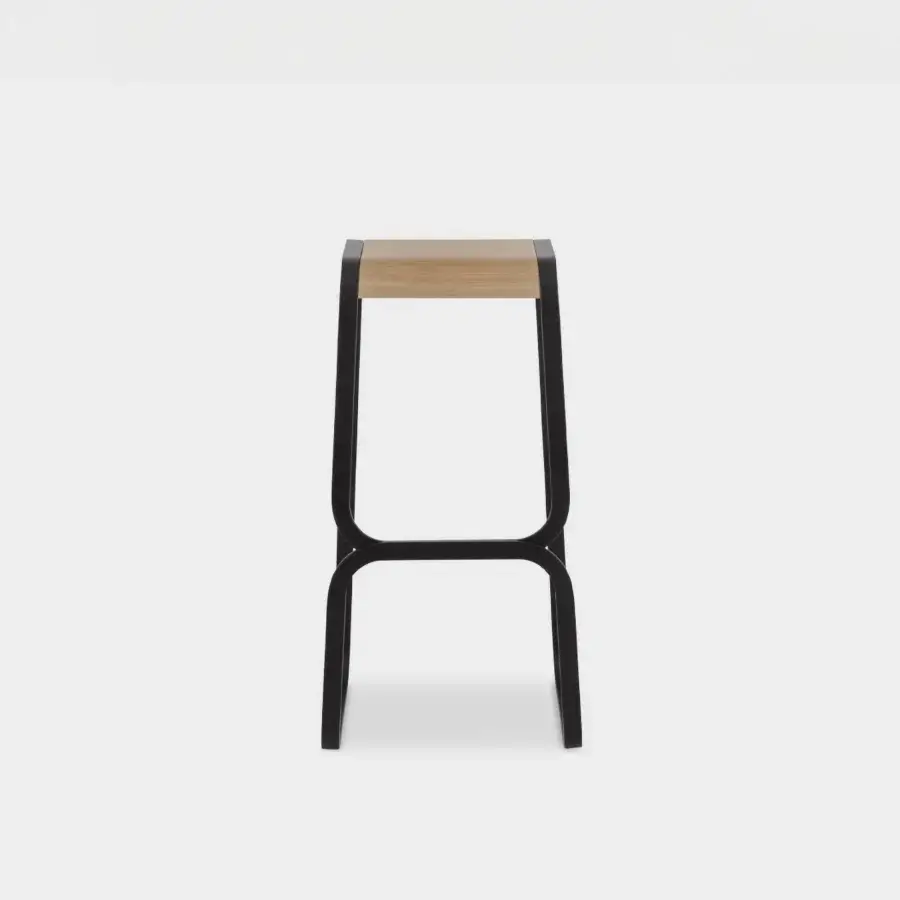 Distinguished Lapalma Continuum stool with sculpted bent metal exhibiting a satin light-toned wood seat crafted in Italy