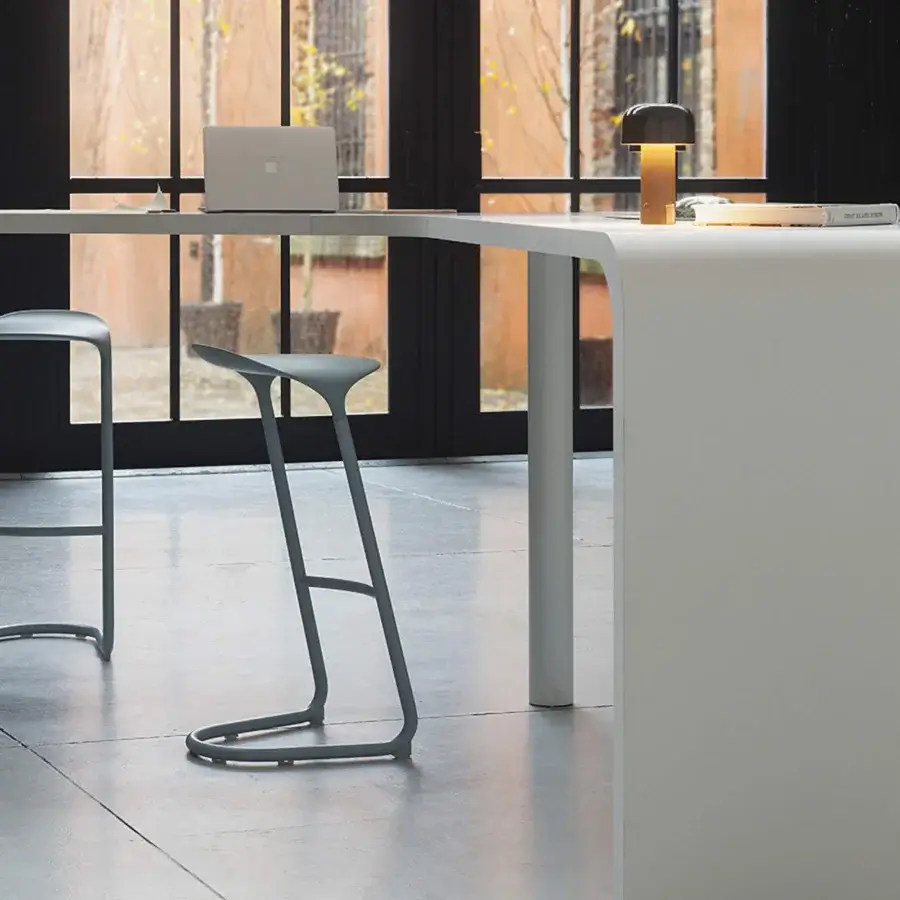 Elegant Lapalma Cross stool built in recyclable metal and polyurethane with a smooth matte finish