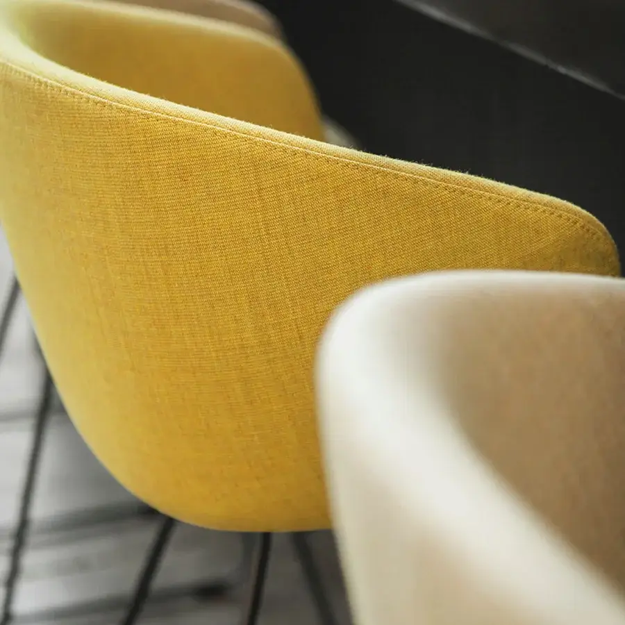 Exceptional Lapalma Glove stool upholstered in vibrant yellow textile with a matte finish and sleek dark metal base