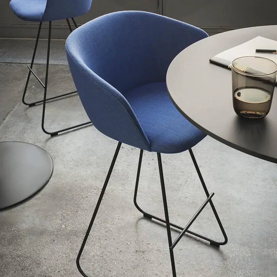 Distinguished Lapalma Glove stool with enveloping fully upholstered seat and matte black metal base crafted in textured muted blue textile
