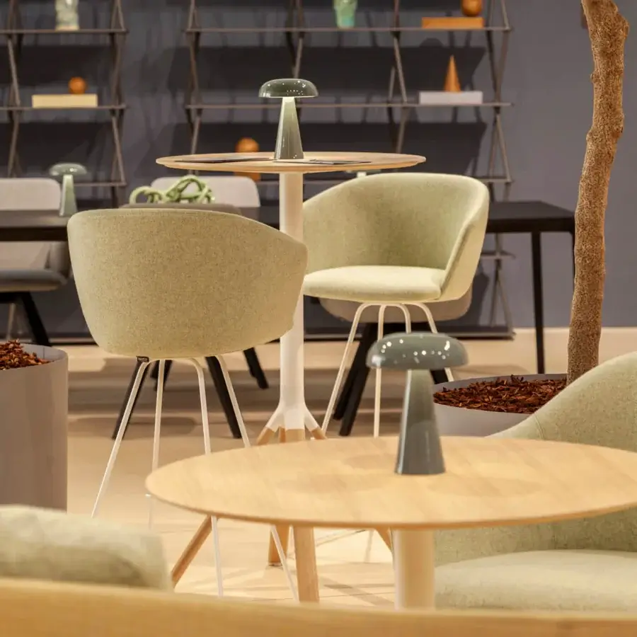 Superior Lapalma Glove stool with enveloping fully upholstered seat in textured matte olive green textile and slender angled light-colored metal legs