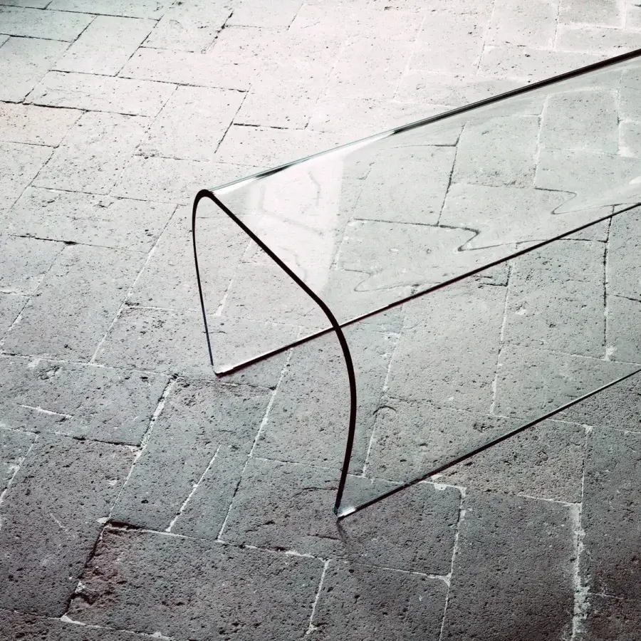 Innovative Glas Italia Bent bench crafted from a single sheet of transparent extralight glass with a curved dark line