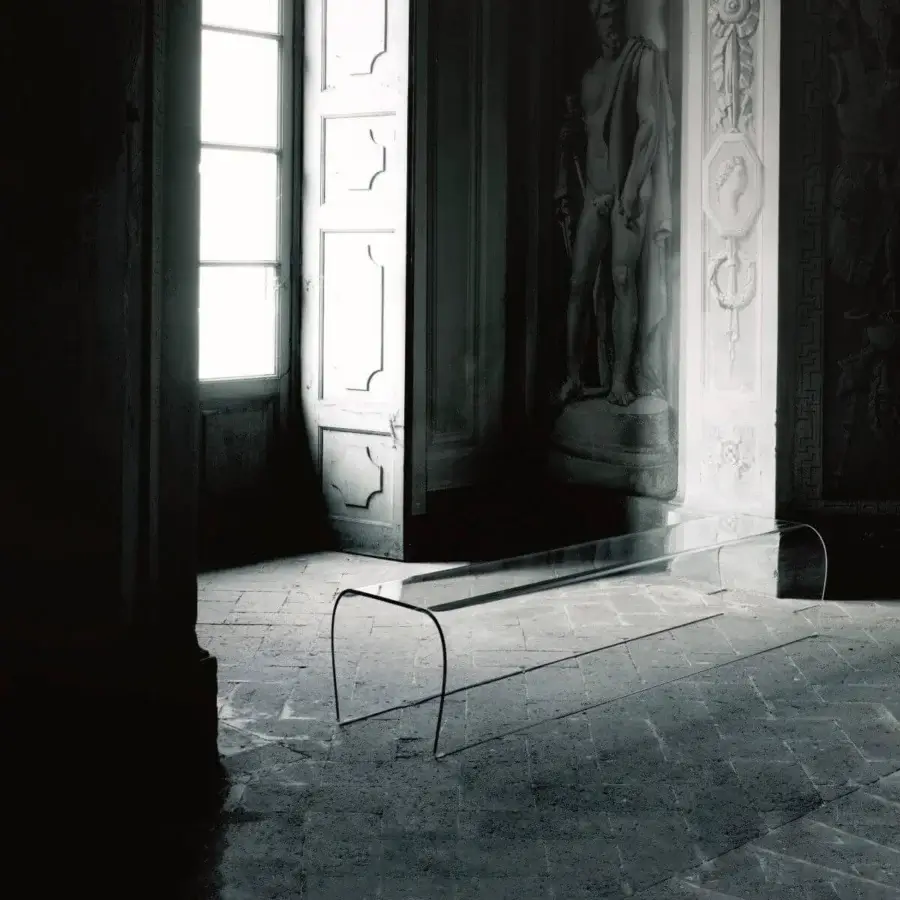 Distinguished Glas Italia Bent bench crafted from a single sheet of transparent extralight glass with a dark gray tone