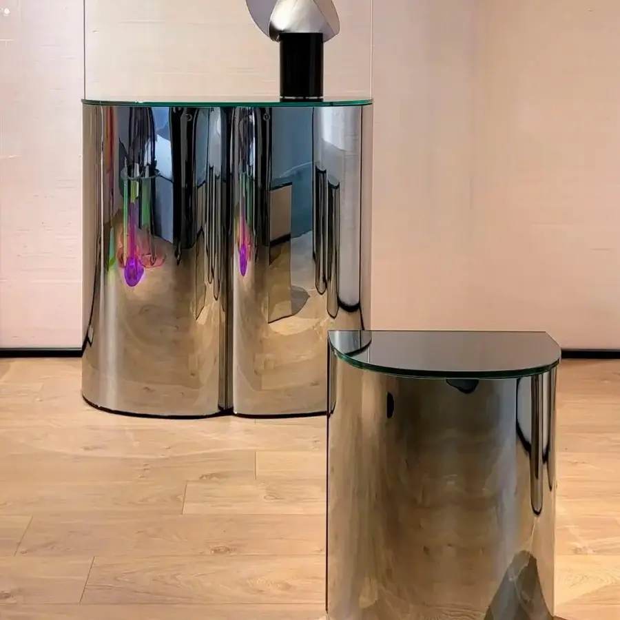 Distinguished Glas Italia Oltralpe nightstand built in fully mirrored laminated glass with soft curves and cylindrical handles