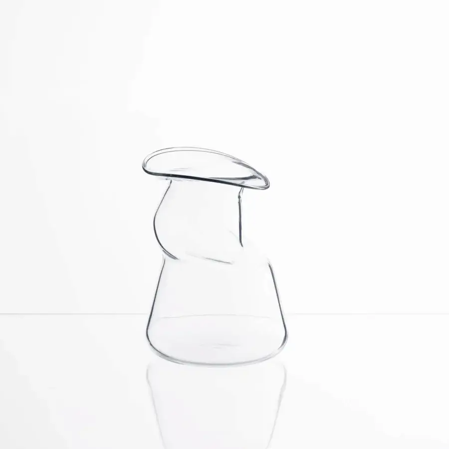 Exceptional Glas Italia Transformer Vase crafted in clear borosilicate glass with flowing curved lines and a glossy finish
