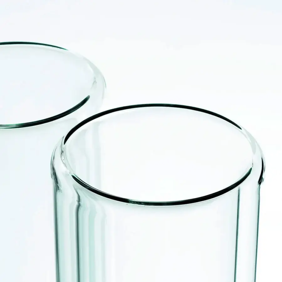 Distinguished Glas Italia Tutube vase crafted in transparent borosilicate glass with a unique interior concavity and sleek finish