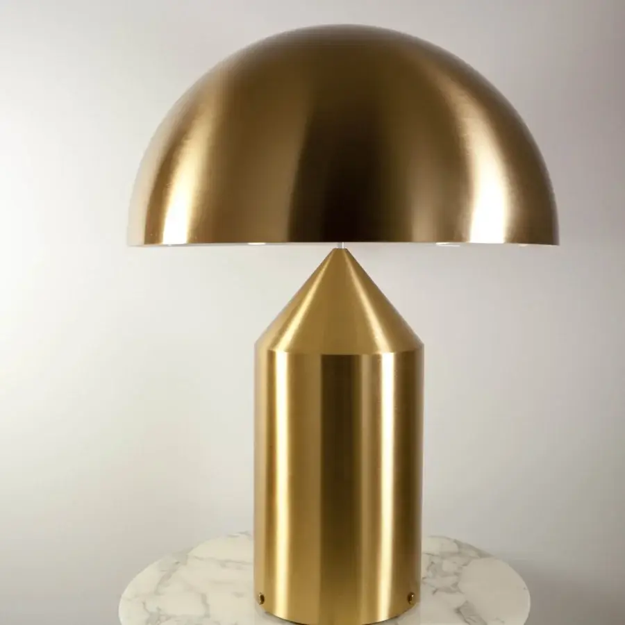 Distinguished Oluce Atollo Metal Table Lamp crafted in polished metal with a warm white glossy finish