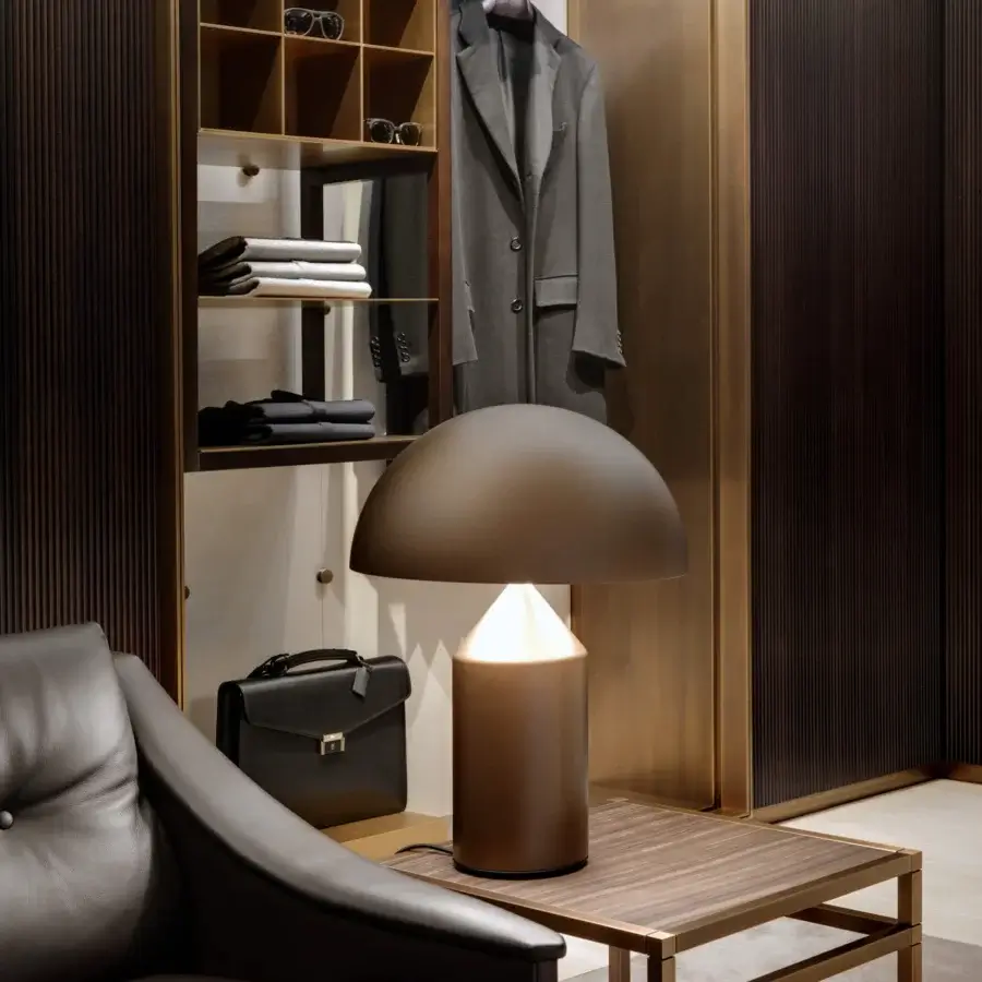 Elegant Oluce Atollo Metal Table Lamp crafted in warm neutral beige with polished metal and flowing lines