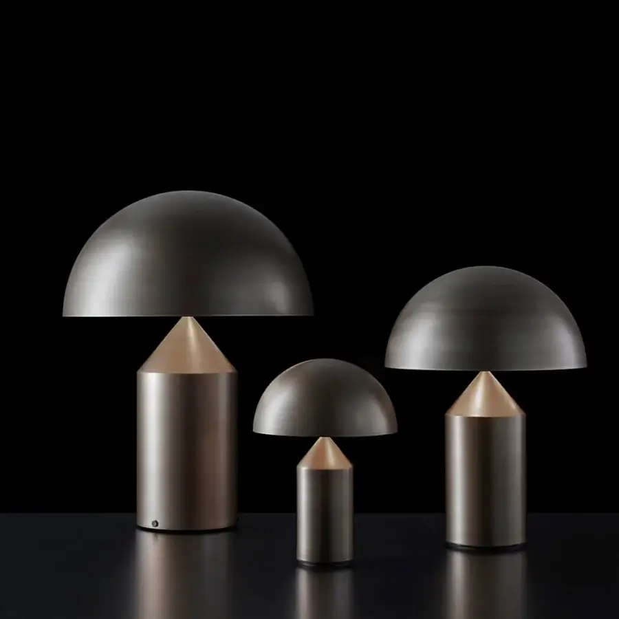 Exceptional Oluce Atollo Metal Table Lamp crafted in warm neutral beige with a glossy polished metal finish