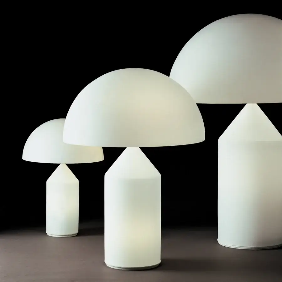 Elegant Oluce Atollo Glass Lamp crafted in opaque glass with a brushed silver-toned metallic base embodying contemporary style