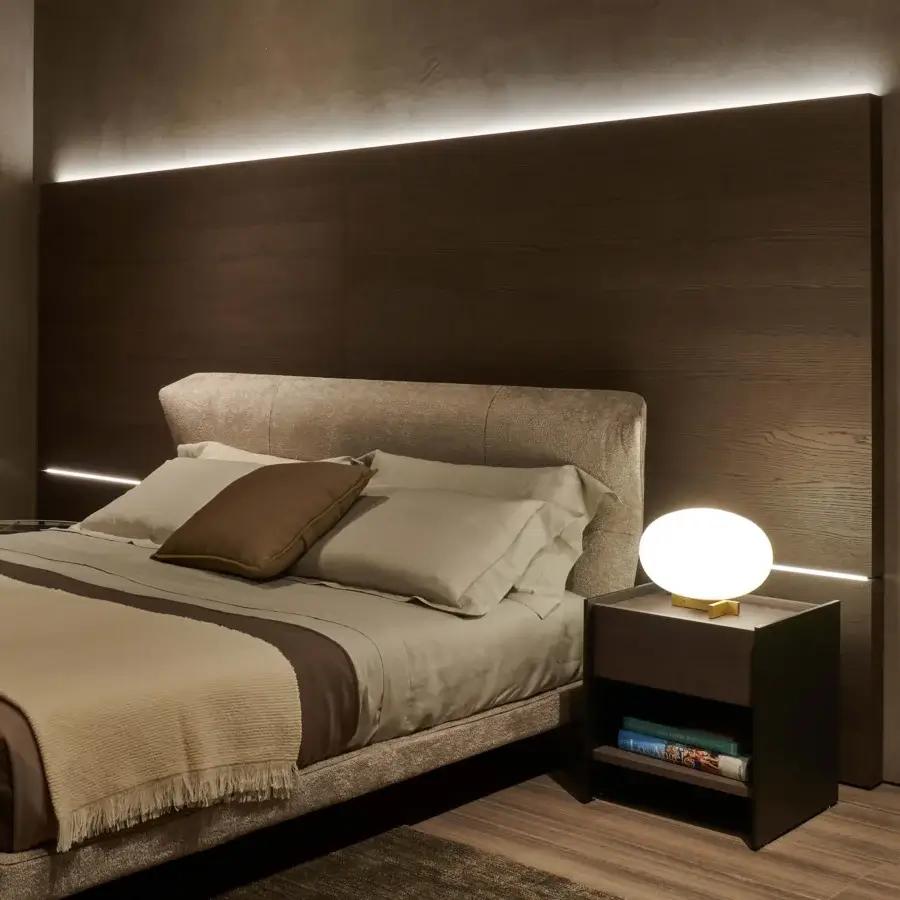 Elegant Oluce Alba table lamp with softly rounded form and glossy off-white finish crafted in Italy