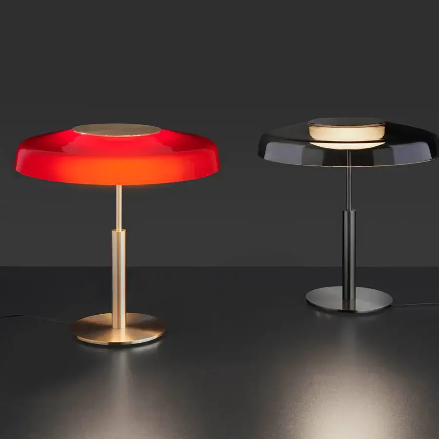 Superior Oluce Dora lamp embodies Italian design with a red gradient glass lampshade and polished golden-toned metal base