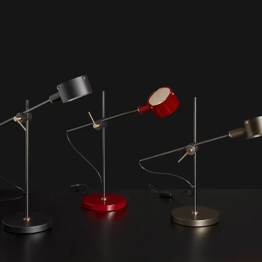 Sophisticated Oluce G.O table lamp crafted in red metal with a smooth satin finish showcasing geometric form
