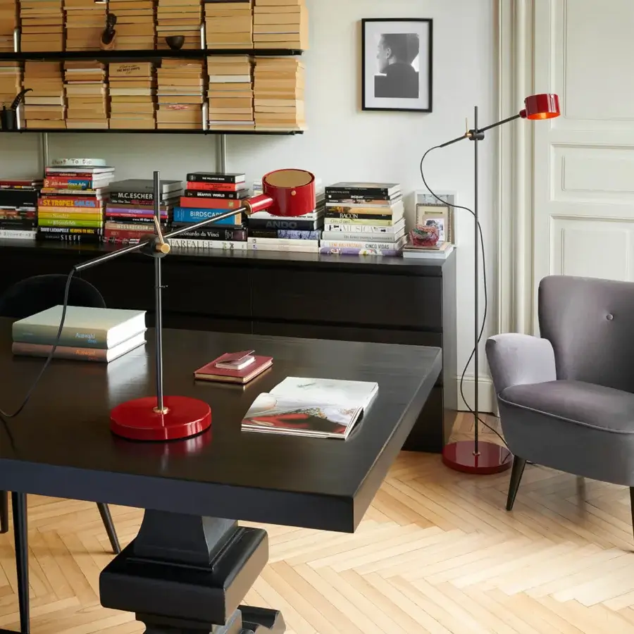 Exceptional Oluce G.O table lamp crafted in red metal with a satin-finish synthetic material and adjustable conical lampshade