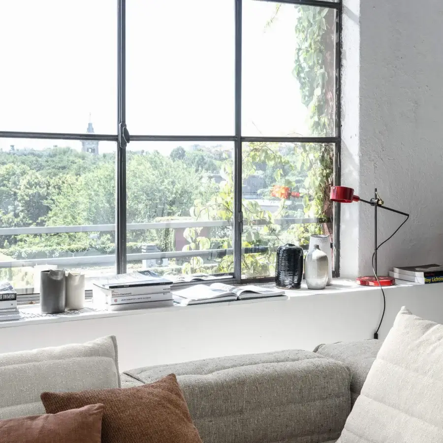 Distinguished Oluce G.O table lamp crafted in glossy red metal with a flexible articulated arm and conical lampshade