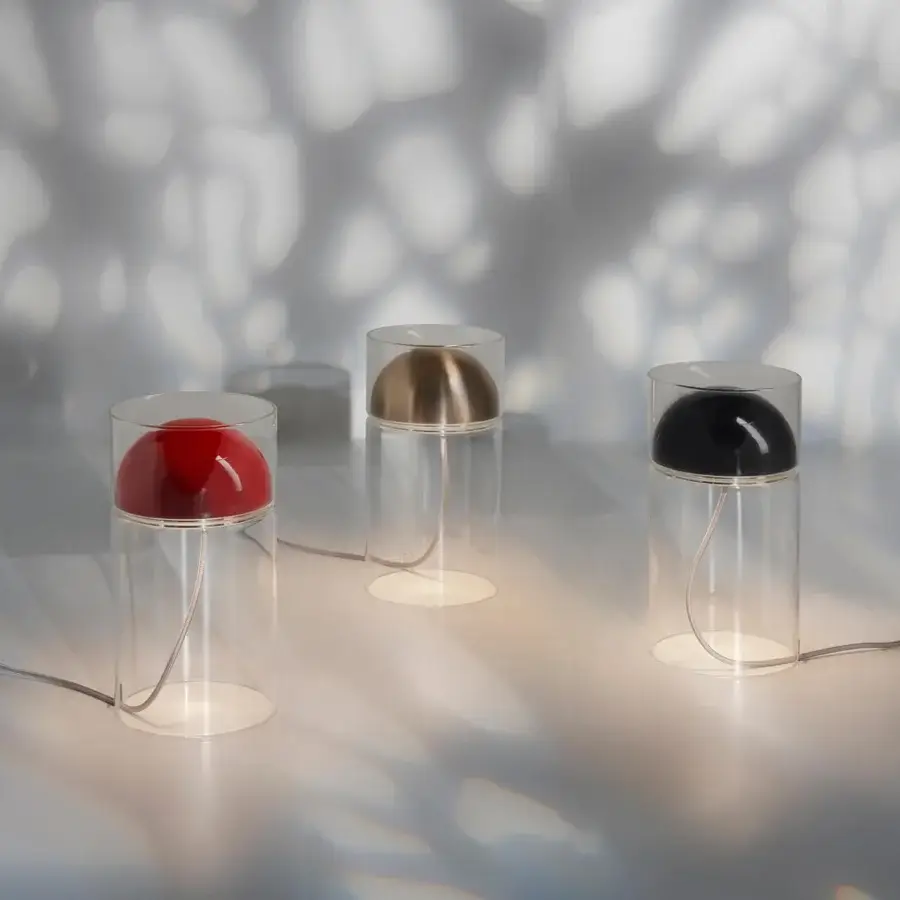 Exceptional Oluce Medusa lamp crafted in clear glass with a glossy red shade and freely descending cable