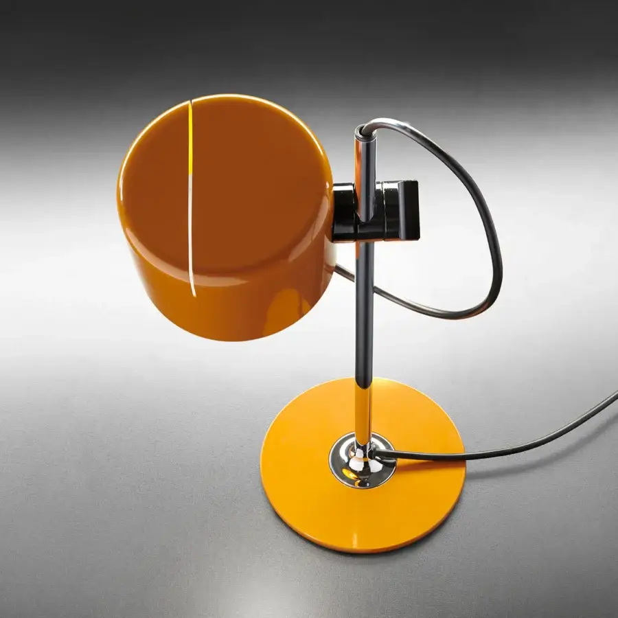 Distinguished Oluce Coupé & Mini Coupé lamp with a glossy orange plastic shade and polished steel stem, awarded for innovative design
