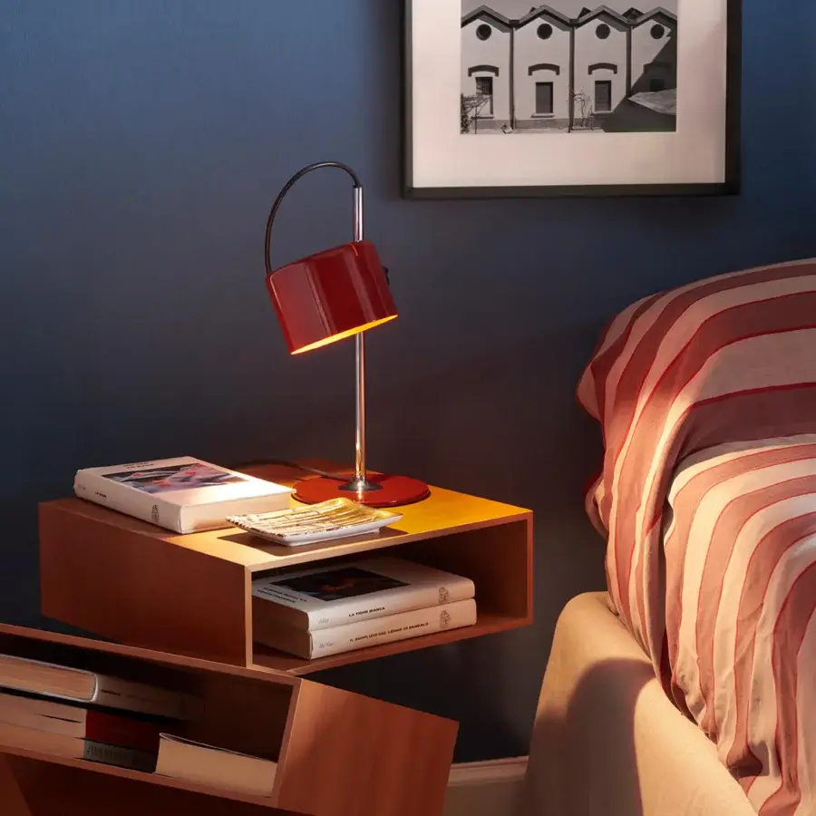 Distinguished Oluce Coupé & Mini Coupé lamp with a glossy metal finish in vibrant red and silvery-grey