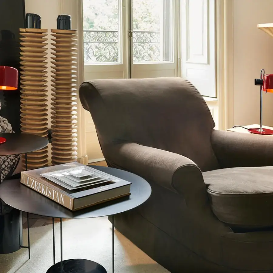 Elegant Oluce Coupé & Mini Coupé lamp crafted in glossy red-toned synthetic material and matte black metal with adjustable shade