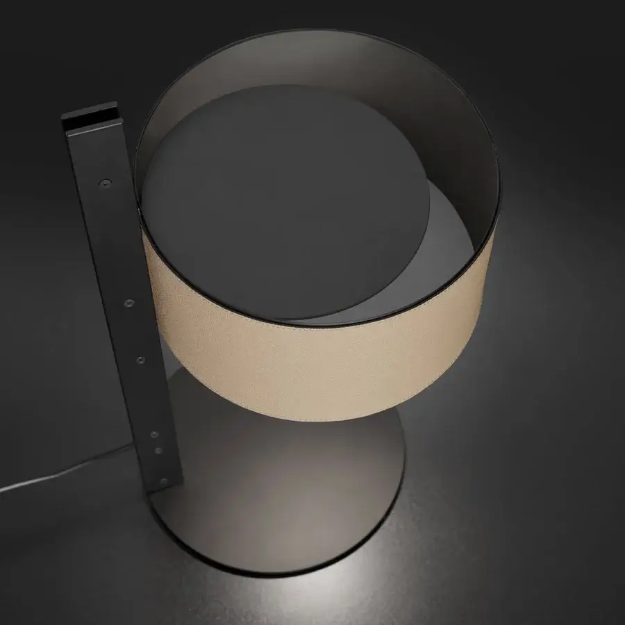 Distinctive Oluce Parallel table lamp crafted in dark gray matte metal with a light beige hammered leather band