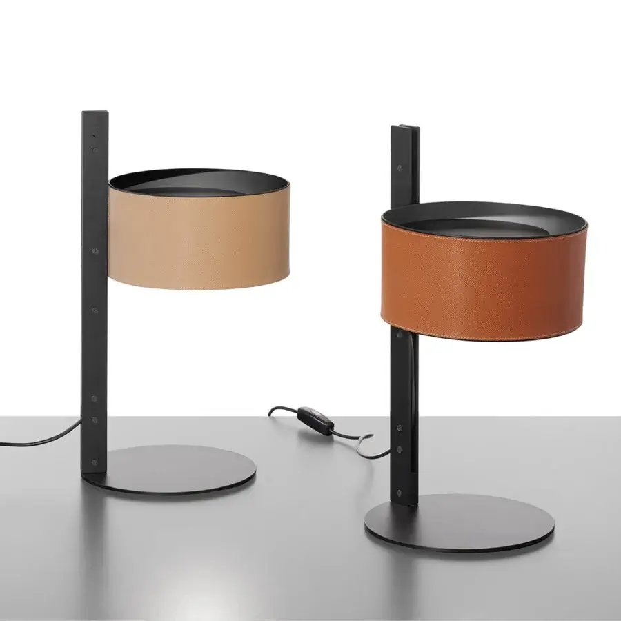 Exclusive Oluce Parallel table lamp with cylindrical reddish-brown hammered leather lampshade and sleek dark metal base