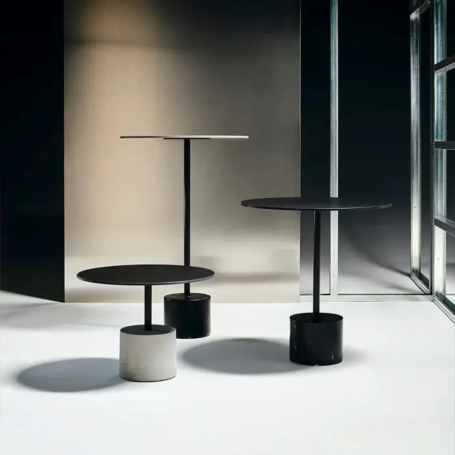 Superior Lapalma Jey table with dark tabletop and textured light grey cylindrical base in matte finish