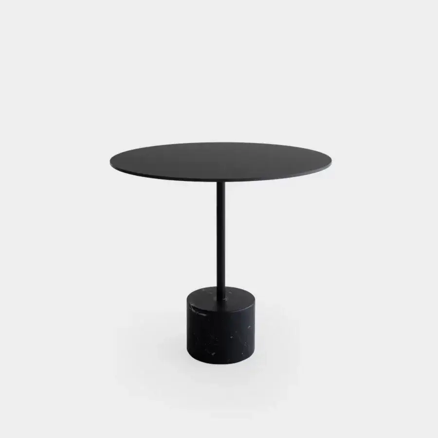 Distinguished Lapalma Jey table crafted with matte black metal and dark veined marble creating a balanced silhouette